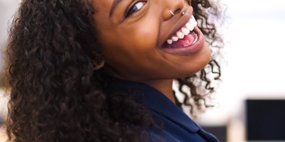 A Woman Smiling with Healthy Teeth