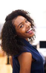 A Woman Smiling with Healthy Teeth