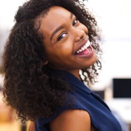 A Woman Smiling with Healthy Teeth