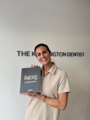 Dr Sandra holding the Spears 500 book