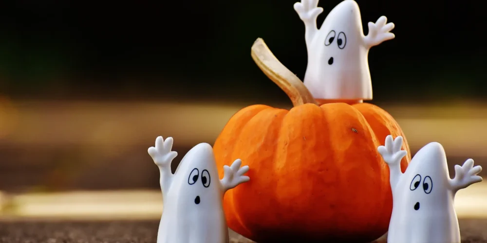 Toy Ghosts on a Pumpkin