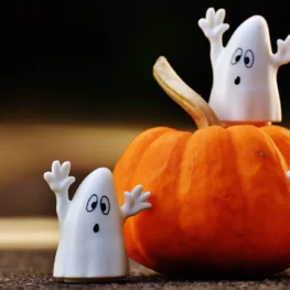 Toy Ghosts on a Pumpkin